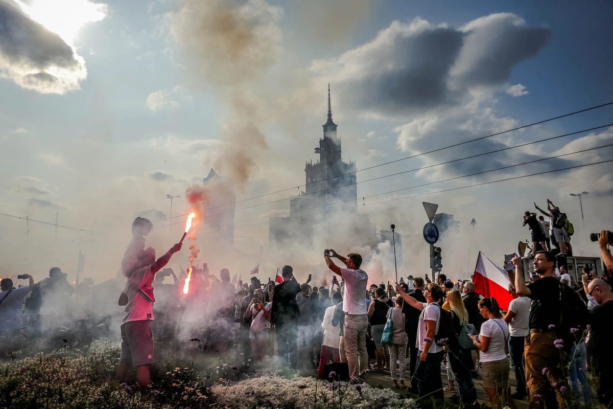 When a City Stops: Finding Home in Warsaw's Moment of Silence Post feature image